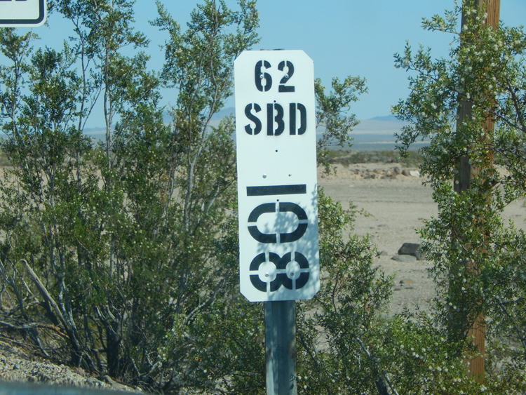 Mile Marker near Rice, California Shoe Fence