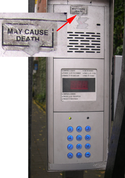 Intercom with 'May Cause Death' sticker, Dublin