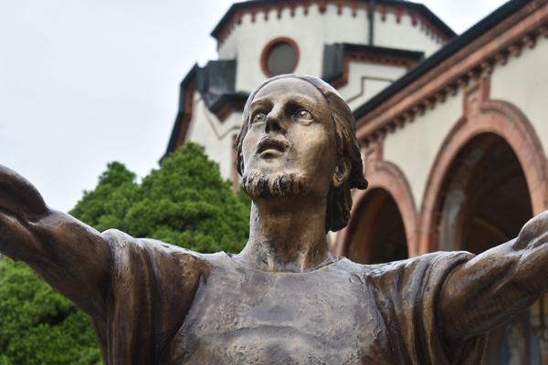 Jesus (?) with outstretched arms, Cimitero di Pavia (detail)